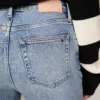 High-Rise Slim Fit Cigarette Jean
         - Medium Wash
