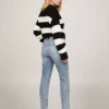 High-Rise Slim Fit Cigarette Jean
         - Medium Wash